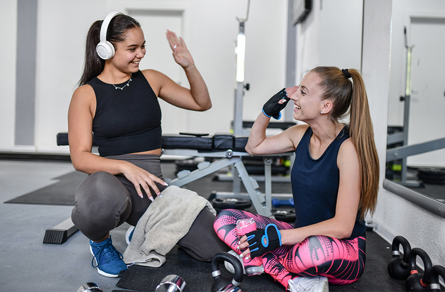 Two young women at the gym