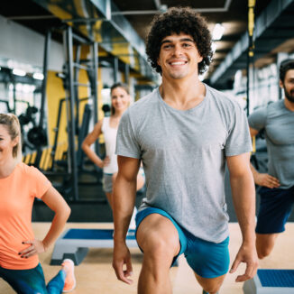 Young residents working out in the fitness center